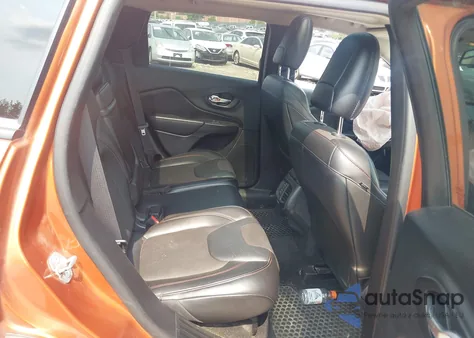 2015 Jeep Cherokee Trailhawk from USA, damaged, VIN 1C4PJMBSXFW776658